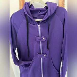 hooded sweatshirt maxi jacket, duster with zip and flap details. Split bottom.